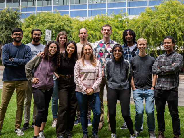 Gardner lab members with LSB in the background.